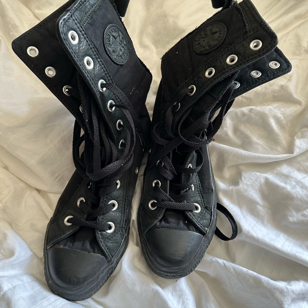 All black Converse kicks in women’s 6.